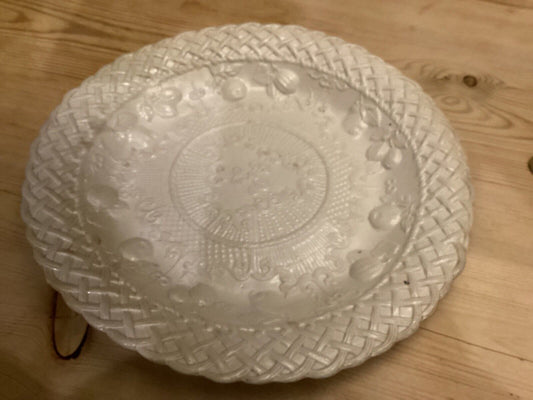 A superb salt glazed stoneware plate. Basketweave and fruit moulding. c.1760