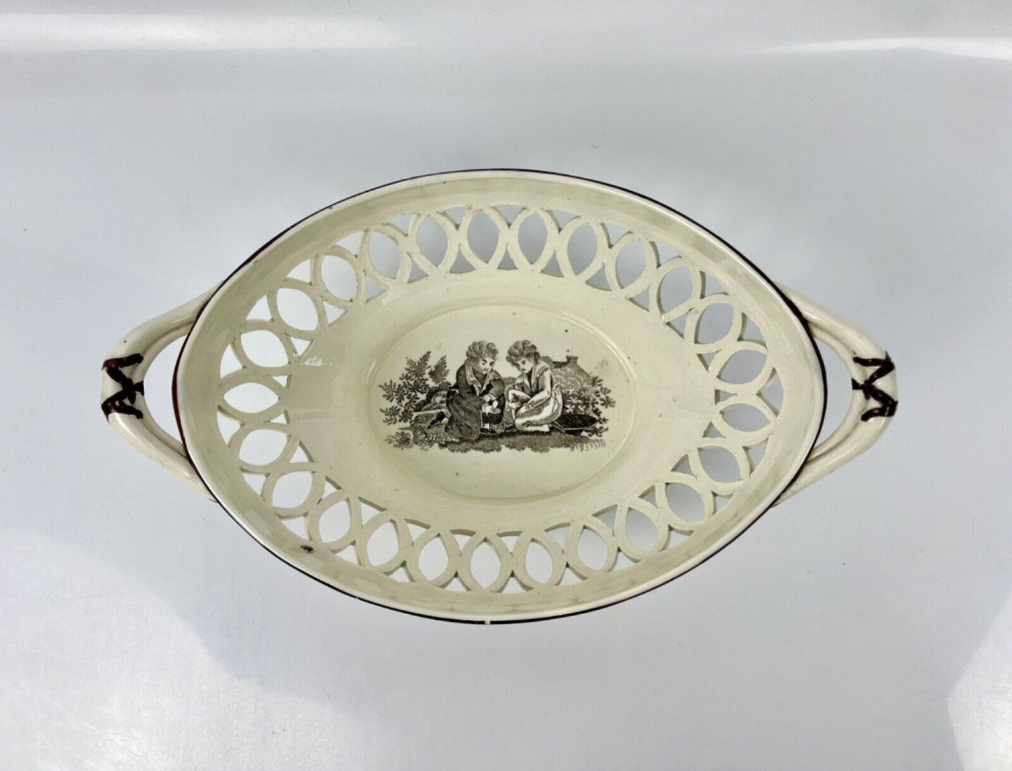 A fine Thomas Fell & Co Newcastle transfer-printed and hand-painted basket c1817