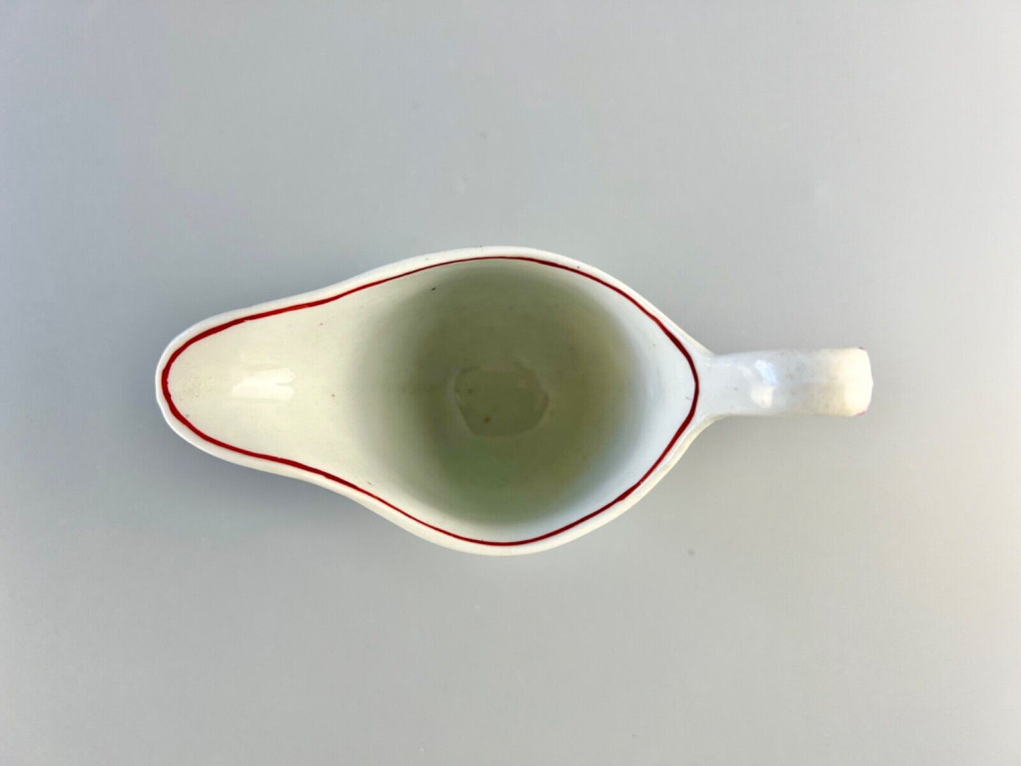 A New Hall clip handled creamer c.1790. Pattern number 78