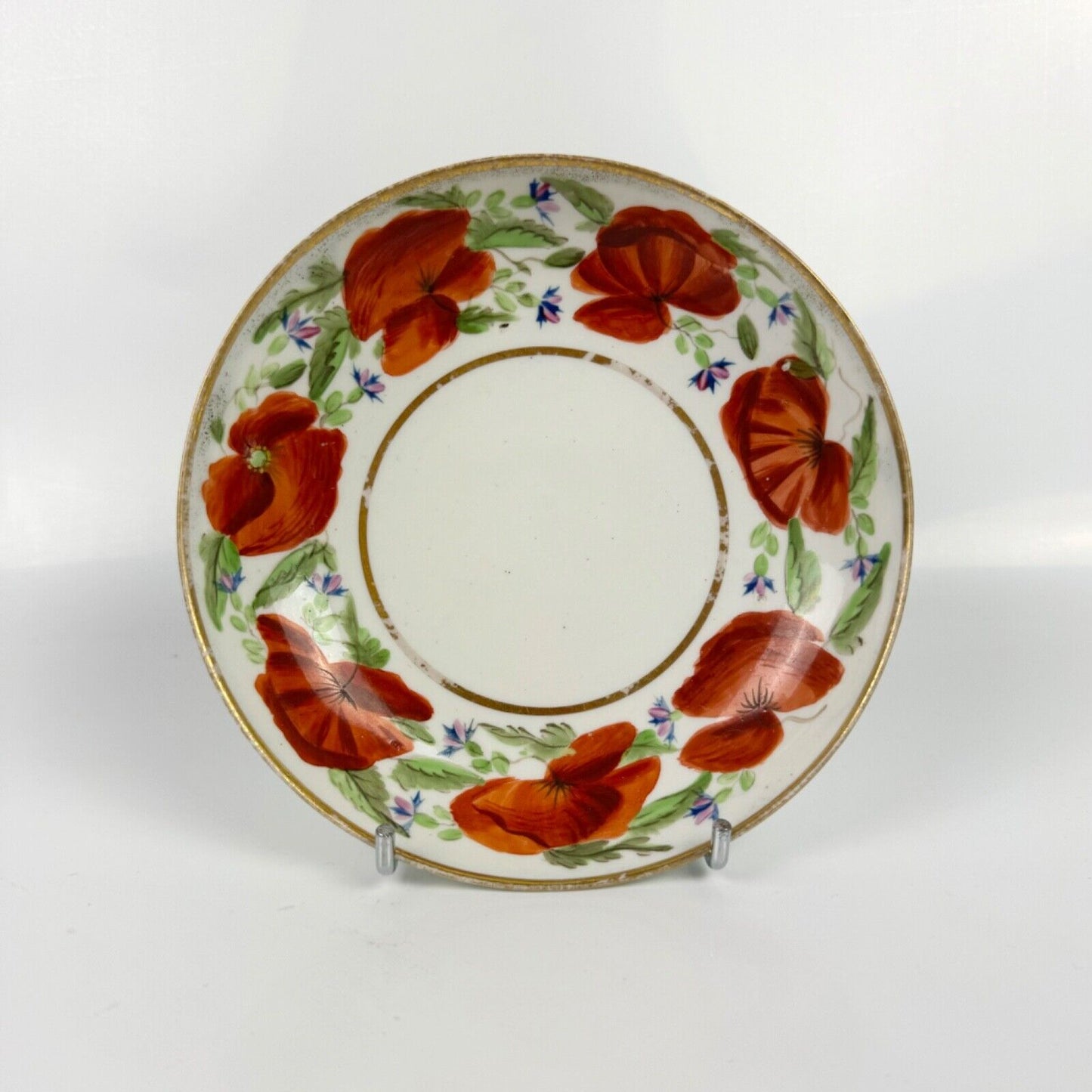 An early 19th century Pinxton coffee can and saucer in pattern 104 circa 1800