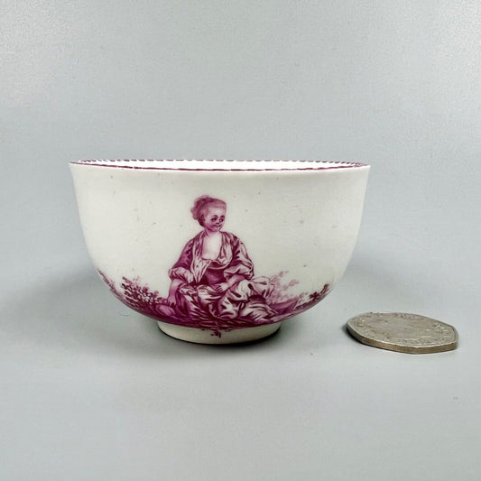 A Vienna porcelain teabowl painted with puce figures c1770-5