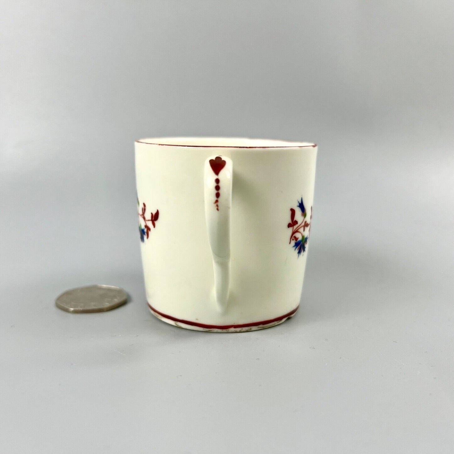 A Pinxton pattern one coffee can painted with Barbeaux Sprigs c1800