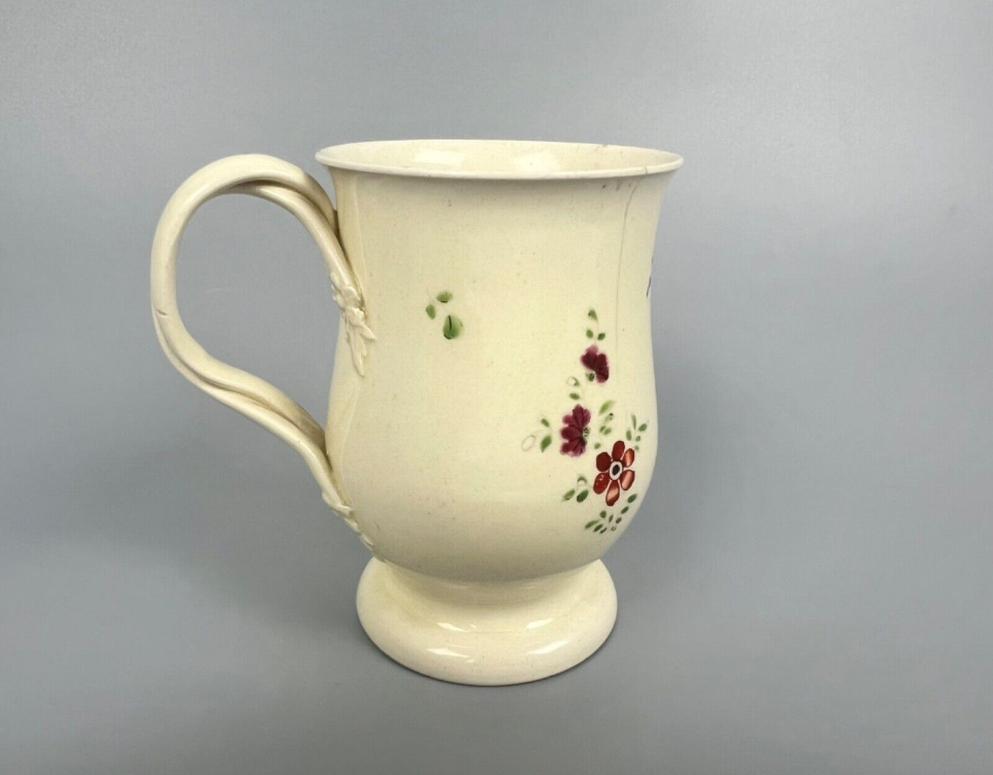 A rare Cockpit Hill Derby floral-painted creamware mug c.1770-5. Ex-Tom Wallford