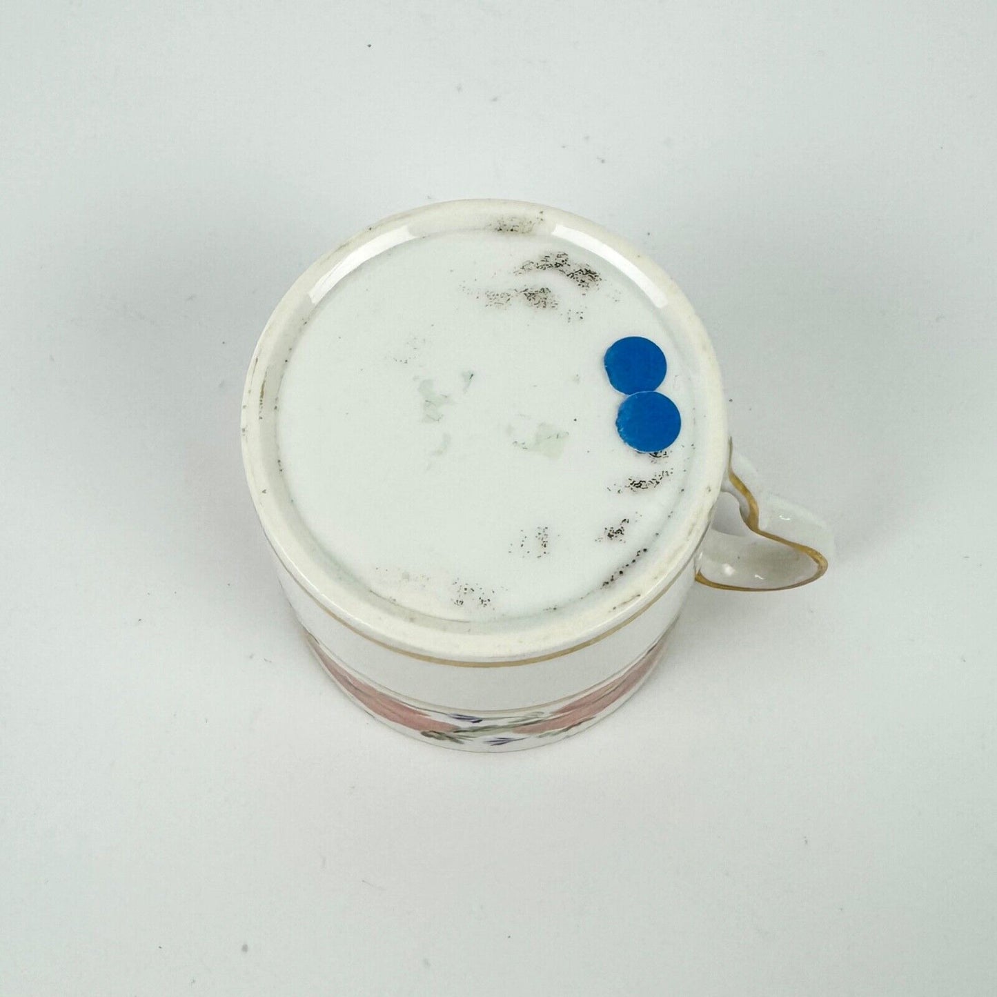 An early 19th century Pinxton coffee can and saucer in pattern 104 circa 1800