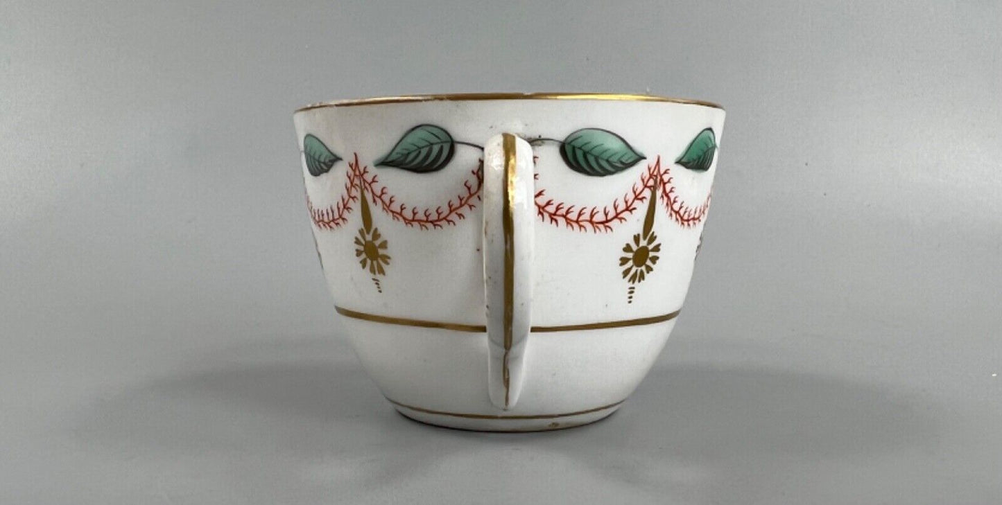 An early 19thc bute shape New Hall cup and saucer in pattern number 1152