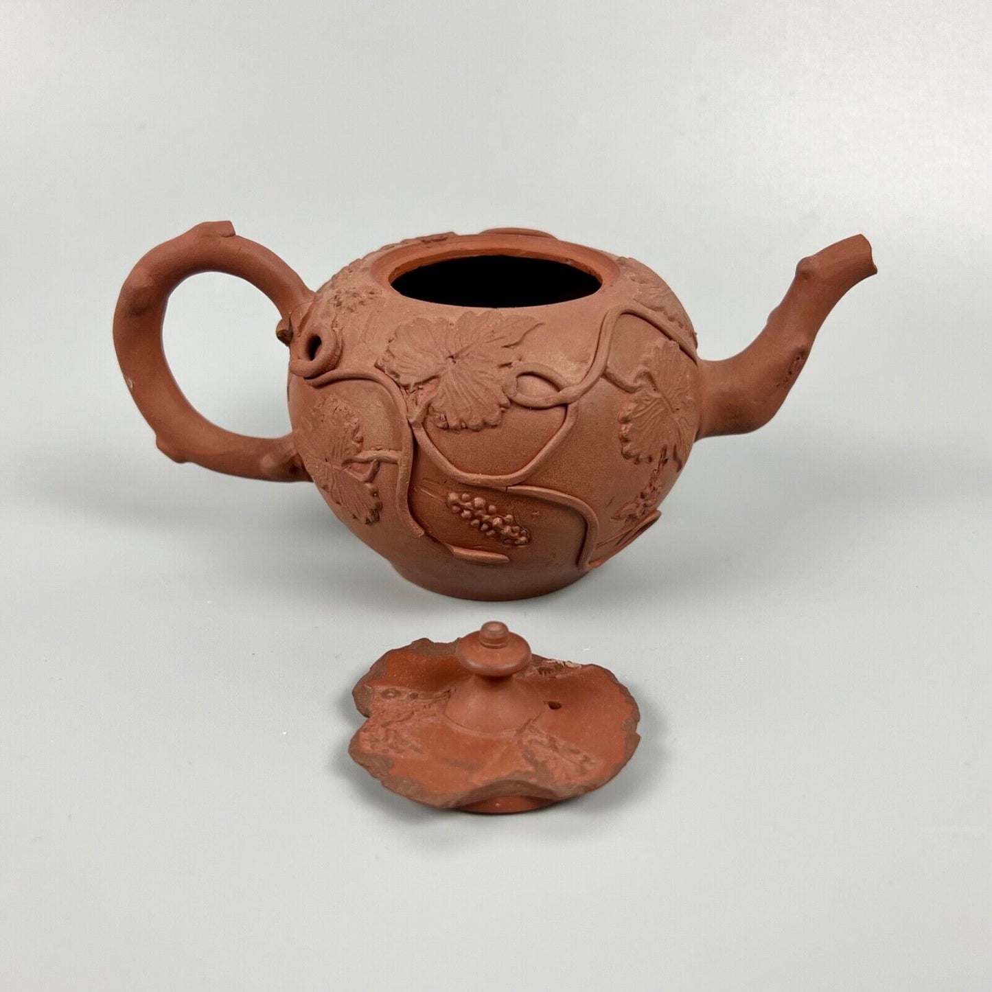 A Diminutive Staffordshire red stoneware teapot with sprigged decoration c.1760