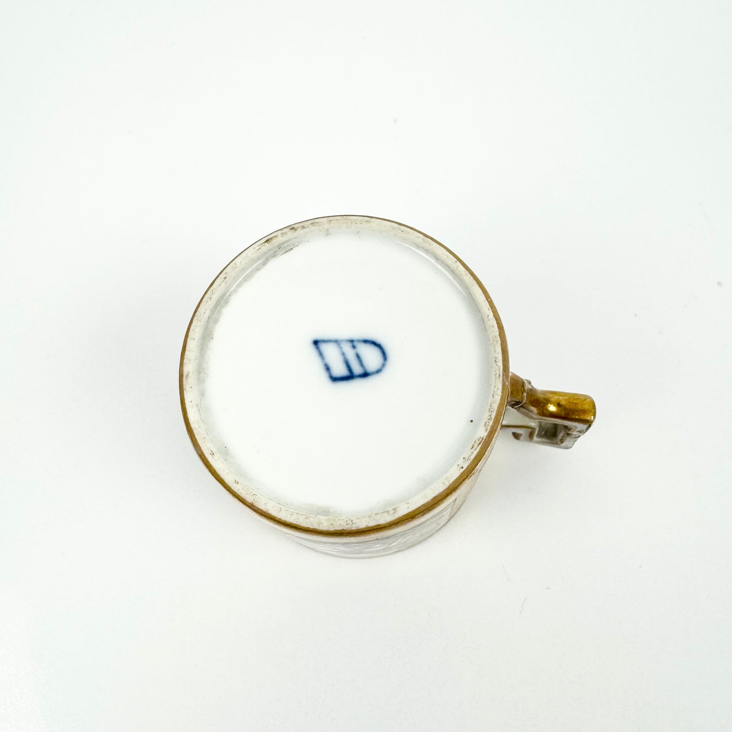 A scarce Royal Vienna miniature coffee can painted with coastal scenes c.1810