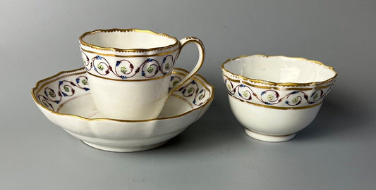 An uncommon Derby scalloped tea bowl and saucer in pattern number 115 c.1784-90