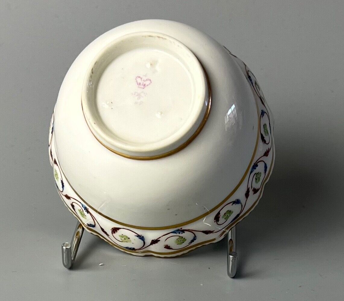 An uncommon Derby scalloped tea bowl and saucer in pattern number 115 c.1784-90