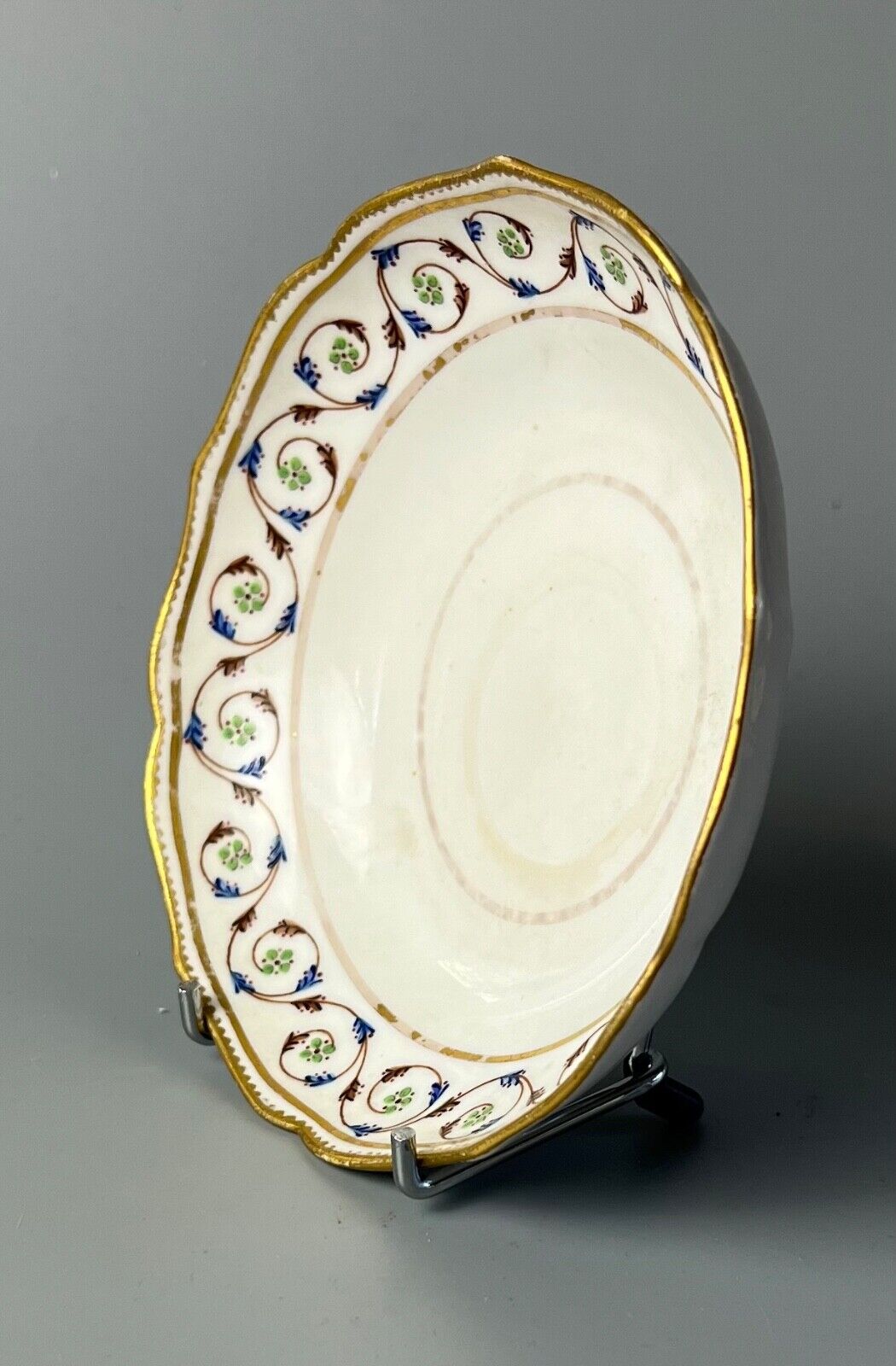 An uncommon Derby scalloped tea bowl and saucer in pattern number 115 c.1784-90
